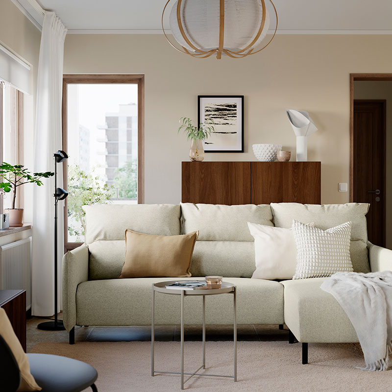 Furnished room with sofa and armchair arranged for maximum comfort.