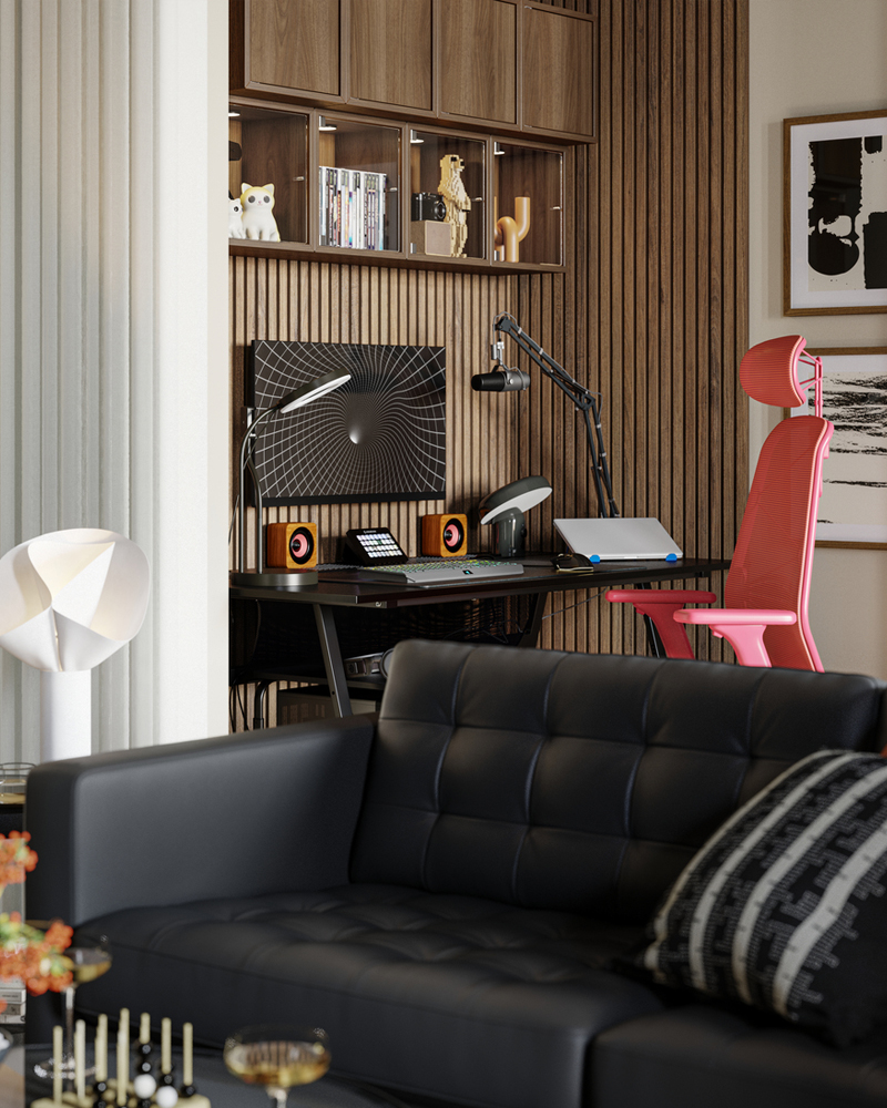 A 3-seat sofa stands in front of a gaming area with an UTESPELARE gaming desk and a red STYRSPEL gaming chair.